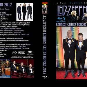 Pode incluir: Uma caixa de disco Blu-ray com uma foto da banda de rock Led Zeppelin. A capa mostra os membros da banda em trajes formais, recebendo as Kennedy Center Honors em 2012. A contracapa lista as músicas incluídas no disco, incluindo "Whole Lotta Love", "Stairway to Heaven" e "Communication Breakdown".