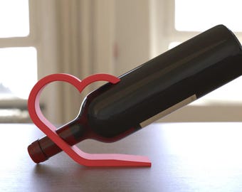 Portabotellas de vino en forma de corazón de Just3dprintings / Decoración elegante y funcional para el hogar