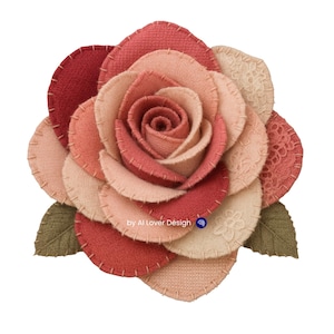 Puede incluir: Una rosa de tela hecha a mano con pétalos en capas en tonos de rojo, rosa y beige. Los pétalos están cosidos con hilo en contraste, y dos hojas verdes están en la base. Diseño de Al Lover Design.