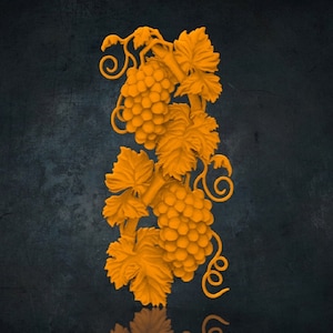 May include: A 3D printed design of a grapevine with leaves and grapes. The design is in a bright orange color and is set against a dark gray background.