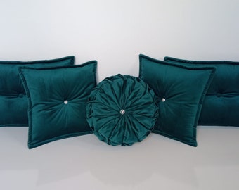 A set of velvet pillows with Swarovski crystals