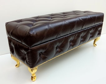 Glamor bench pouffe with golden legs, opening with storage space