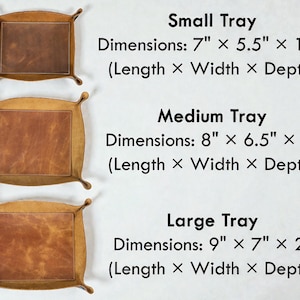 May include: Three brown leather trays of varying sizes are displayed. The smallest tray measures 7" x 5.5" x 1.5", the medium tray is 8" x 6.5" x 2", and the largest is 9" x 7" x 2". Each tray has a rectangular shape with rounded corners.