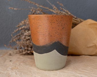 Modern handmade ceramic mug with natural colors will make all your special moments for Mother's day