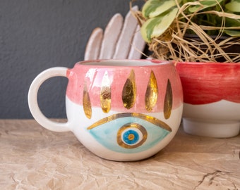 Evil eye handmade big ceramic coffee mug with golden shine glittering which is best gift for Mother’s Day