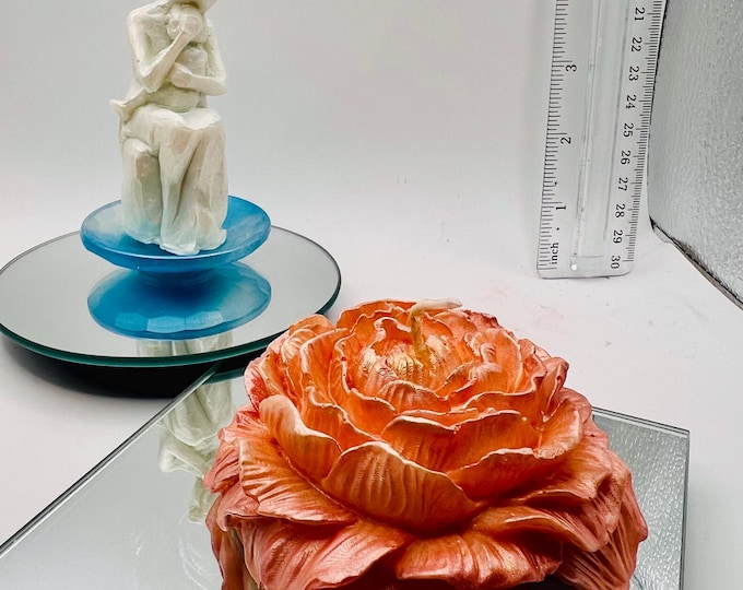 Hand crafted silvery white mother and child soy candle on a resin blue dish paired with a soy apricot colored pansey flower - Free Shipping