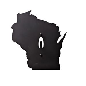 May include: Black metal wall decor in the shape of the state of Wisconsin. The decor has two holes for hanging.