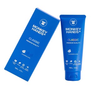 May include: Blue and white tube of Monkey Hands Classic premium quality lubricant. The tube is 3.4 oz and features a monkey logo and the text "Monkey Hands Classic Premium Quality".