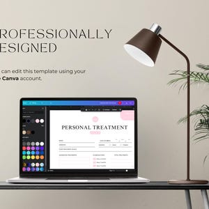May include: A laptop computer displaying a Canva template for a personal treatment form. The template has a pink background and includes fields for name, date of birth, treatment details, and notes. The laptop is on a black table with a brown lamp and a green plant in the background.