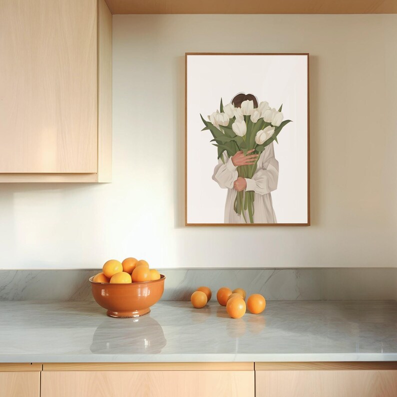 May include: A white framed print of a person holding a bouquet of white tulips. The person is wearing a white dress and is partially obscured by the flowers.