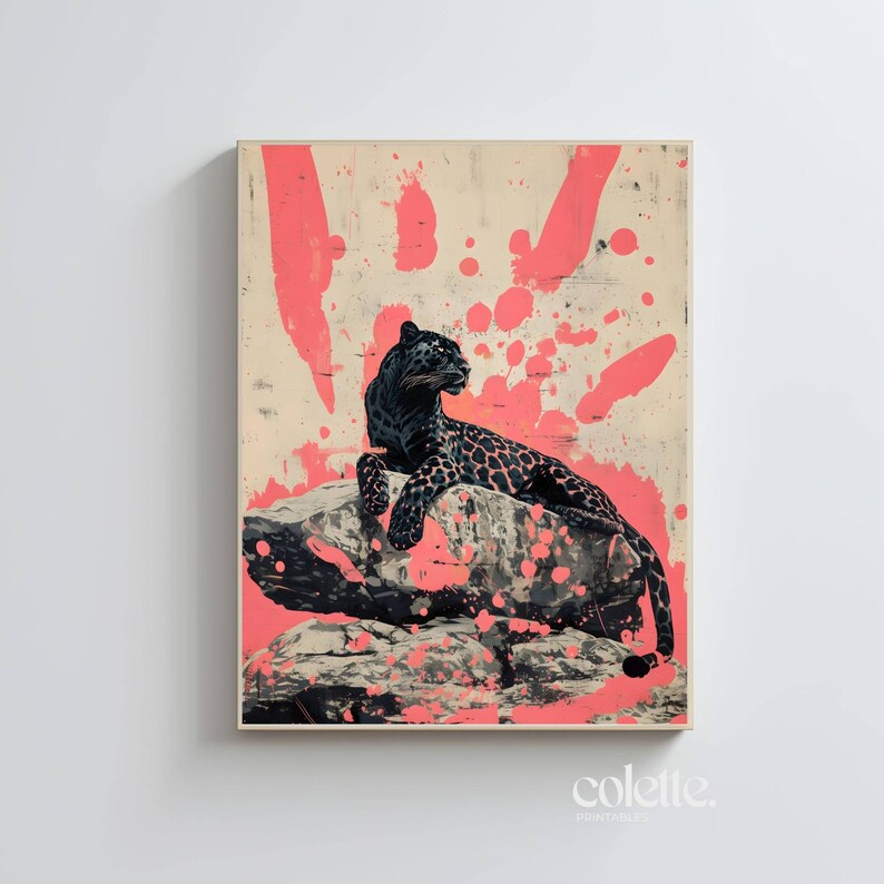 May include: A black panther sits on a rock with a pink and white splatter paint background.