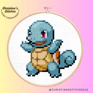 May include: A cross-stitch pattern of a blue and yellow Squirtle Pokemon character. The character is in a walking pose with its tail curled up. The pattern is on a white background.