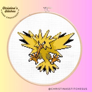 May include: A cross-stitch pattern of a yellow and black Pokemon character, known as Zapdos, in a fighting pose. The character is depicted with sharp claws and a fierce expression.