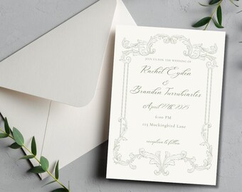 Könnte beinhalten: Eine cremefarbene Hochzeitseinladung mit einem verzierten Rahmen und passendem Umschlag. Die Einladung enthält die Namen Rachel Eyden und Brandon Turrubiartes sowie Datum und Uhrzeit der Hochzeit. Die Einladung liegt auf einer grauen Oberfläche.