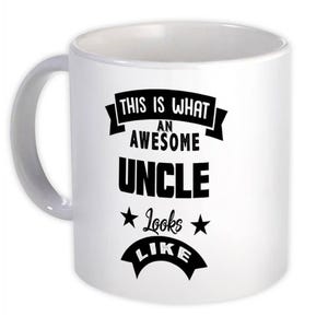 May include: White ceramic coffee mug with a black design that reads "This is what an awesome uncle looks like".