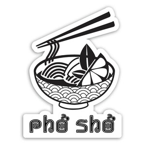 May include: Black and white sticker depicting a bowl of pho with chopsticks, noodles, and a lime wedge. The bowl has a decorative pattern. The text "phở shở" is below the bowl.