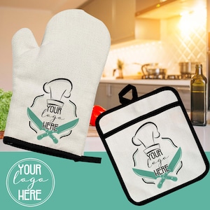 May include: White oven mitt and pot holder with black trim. Both feature a green chef hat and crossed knives with the text "Your logo here".