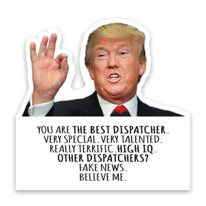 May include: A white sticker with an image of a man in a black suit and red tie, giving an "okay" hand gesture. The sticker has text that reads "YOU ARE THE BEST DISPATCHER. VERY SPECIAL. VERY TALENTED. REALLY TERRIFIC. HIGH IQ. OTHER DISPATCHERS? FAKE NEWS. BELIEVE ME."