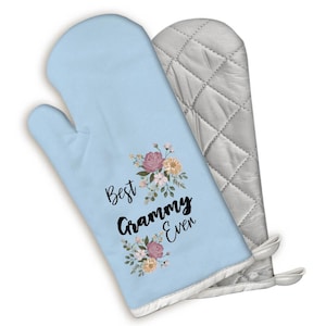 May include: Blue oven mitt with a floral design and the text "Best Grammy Ever". The back of the mitt is silver and quilted.