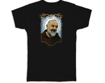 May include: Black t-shirt featuring a portrait of a man with a white beard and a halo. The portrait is framed with a gold ornate border. The man is wearing a brown robe. The background is a light blue color.