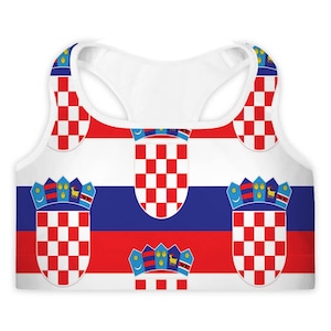 May include: White sports bra featuring the Croatian coat of arms and flag design. The design includes red and white checkered patterns, blue and red stripes, and crown details. The bra has a racerback style.