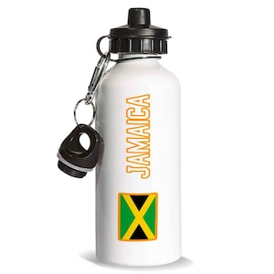 May include: White water bottle with a black cap and a silver carabiner clip. The word "JAMAICA" is printed vertically in orange, along with the Jamaican flag. The bottle is designed for hydration.