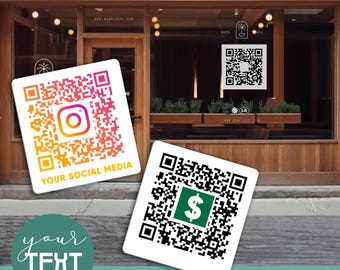 May include: Two square QR code stickers. The first QR code is rainbow colored and has an Instagram logo in the center. The text "YOUR SOCIAL MEDIA" is below the QR code. The second QR code is black and white with a green dollar sign in the center. The text "your TEXT" is written in cursive below the QR codes.