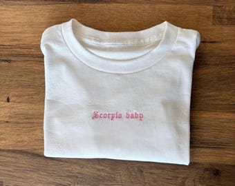 Custom embroidered women’s baby tee - custom T-shirt embroidery - longline baby tee