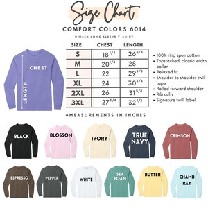 Op de afbeelding: Een maattabel voor het Comfort Colors 6014 t-shirt met lange mouwen, met afmetingen in inches voor de maten S tot 3XL. De tabel bevat een visuele gids, stofeigenschappen en een kleurenpalet met black, blossom, ivory, true navy, crimson, espresso, pepper, white, sea foam, butter en chambray.