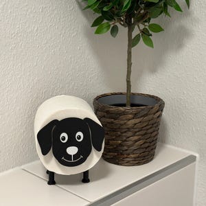 Toilet paper holder as a dog