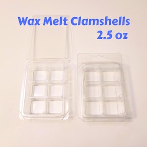 May include: Two clear plastic wax melt clamshell containers, one open and one closed, each with six square compartments. Text in blue reads "Wax Melt Clamshells 2.5 oz".