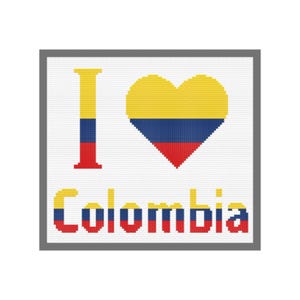 Puede incluir: Patrón de punto de cruz con las palabras "Me encanta Colombia" y un corazón en forma de bandera colombiana en el centro.