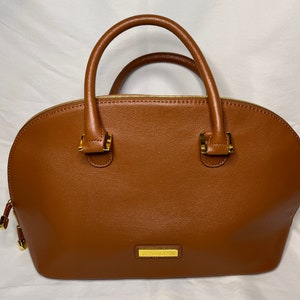 Joy and store iman satchel
