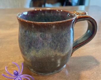 Hand-thrown pottery mug