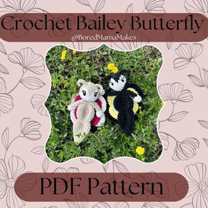 May include: Two crocheted butterfly toys, one beige and one black, rest on green grass. The beige butterfly has red and beige wings, while the black butterfly has yellow and white wings. The image includes the text "Crochet Bailey Butterfly" and "PDF Pattern".