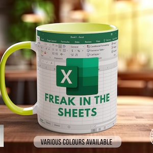 a coffee mug with the words freak in the sheets on it with a spreadsheet as a background