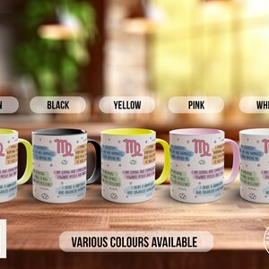 a row of coffee mugs sitting on top of a wooden table