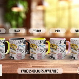 May include: Five mugs with different coloured rims, each featuring a black and white illustration of a teacup with the text "A cup of positivity" and other doodles. The mugs are displayed on a wooden surface with the text "Various colours available" below.