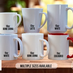 a group of coffee mugs sitting on top of a wooden table