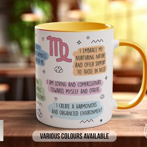 May include: White ceramic mug with a yellow rim and handle. The mug features a Virgo zodiac symbol and text that reads "I embrace my nurturing nature and offer support to those in need. I am loving and compassionate towards myself and others. I create a harmonious and organized environment." The mug also has the text "Various colors available."