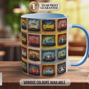 May include: A white ceramic mug with a blue handle and interior, decorated with a grid of classic car illustrations in various colours. The mug has the text "VARIOUS COLOURS AVAILABLE" and "YEAR PRINT GUARANTEE".