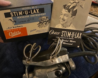 Vintage Oster Stim-U-Lax Modell M-3 Barber Massageinstrument med låda och manual