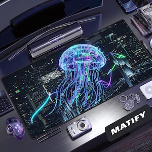 May include: A rectangular desk mat featuring a vibrant, neon-colored digital jellyfish illustration against a dark, glitch-effect background. The design incorporates shades of cyan, magenta, and purple, with intricate line work and data-like patterns.