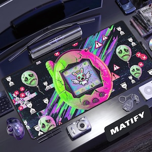 May include: A rectangular desk mat featuring a cracked, neon pink and green digital pet toy graphic at the center. The background displays a dark, glitch-style pattern with floating green skull balloons, white hourglass icons, and red warning symbols.