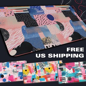 Puede incluir: Un tapete de ratón con un diseño abstracto colorido con formas geométricas rosas, azules, negras y blancas. El tapete de ratón está disponible en tres diseños diferentes. Envío gratuito a los Estados Unidos.