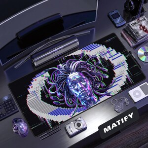May include: A rectangular desk mat featuring a central graphic of a metallic, chrome-like human head with numerous black cables extending from it like hair, surrounded by a cascading pattern of glitching computer windows on a black background.