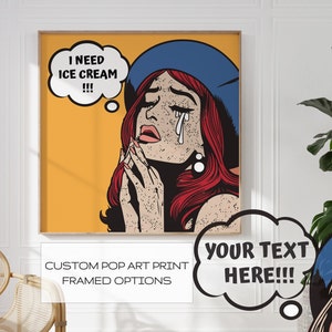 May include: A pop art print featuring a woman with red hair wearing a blue beret. She is crying and has a thought bubble above her head that says "I need ice cream!!!". The background is yellow. The print is available in framed options.