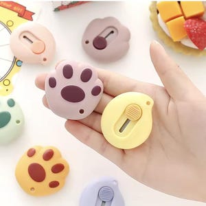 Mini cortador de patas de gato: corte preciso y portátil