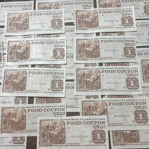 vintage paper food stamps/coupons from 1970’s 80’s. photo shows multiple examples of $1 denomination usda food coupons. each stamp is printed in tan ink with a scene of the signing of constitution. each note says “Food Coupon” and has large 1.