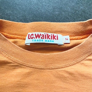T-shirt LC Waikiki Boomerang Show Master Orange 14Ans Singe Prints Etiquette OG Vintage Rare France 90s image 3